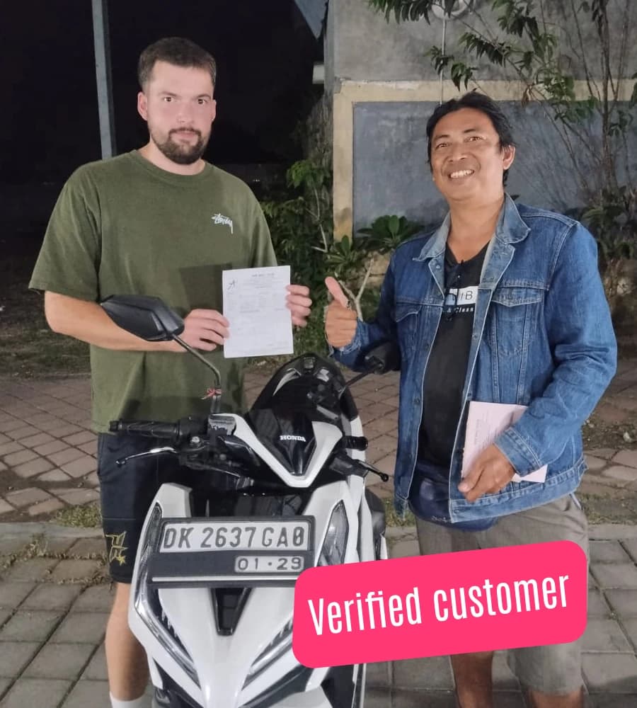 Verified customer enjoying scooter rental in Bali - Happy traveler with Honda scooter
