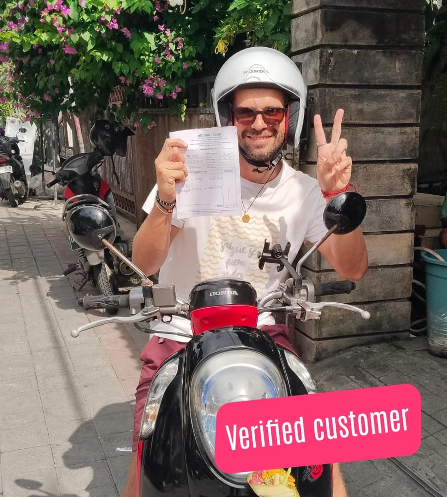 Satisfied customer with premium Yamaha scooter rental in Jimbaran, Bali