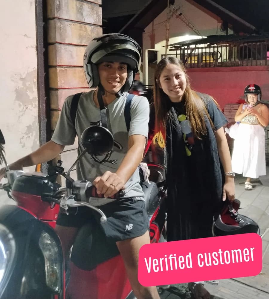 Happy couple with scooter rental in Bali - Premium delivery service